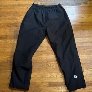 Medium men’s Black Footjoy rain pants for golf